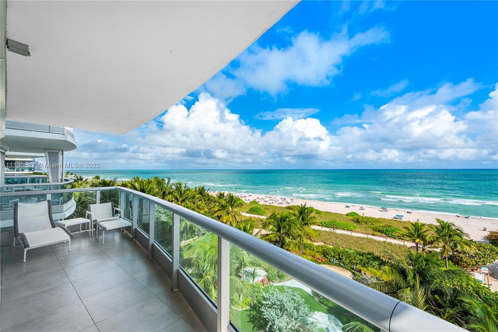 9401 Collins Avenue, Unit 607 Surfside, FL 33154 - Photo 37 of 58 a view of ocean from a balcony