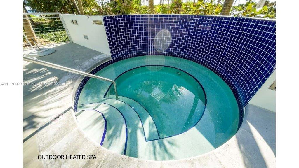 9401 Collins Avenue, Unit 607 Surfside, FL 33154 - Photo 39 of 58 a view of swimming pool