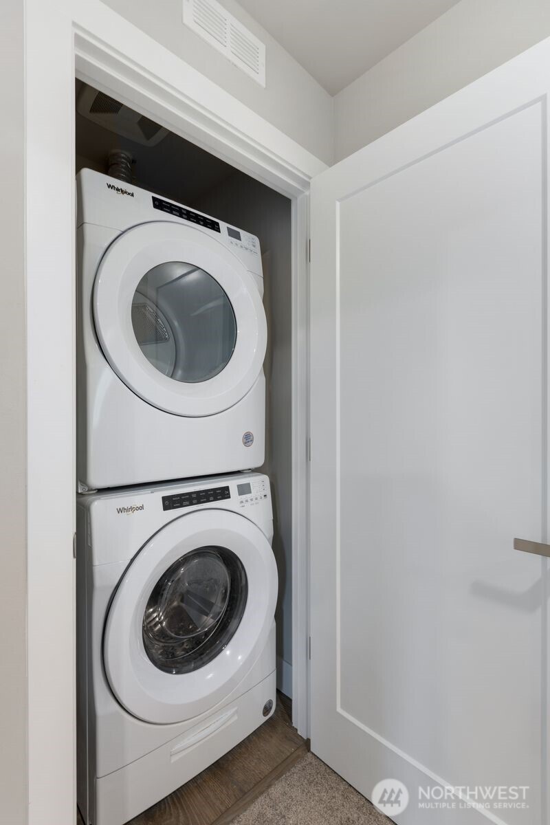 826 238th Place Southeast, Unit F Bothell, WA 98021 - Photo 25 of 39 a utility room with dryer and washer