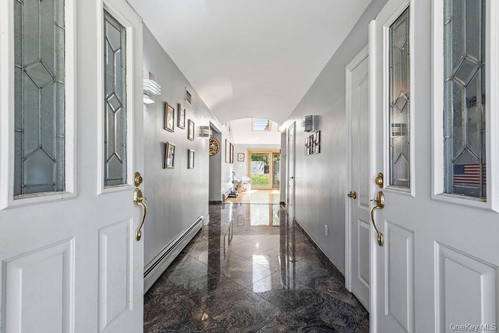 10 Elyise Road Monsey, NY 10952 - Photo 24 of 40 a view of a hallway with wooden floor and staircase