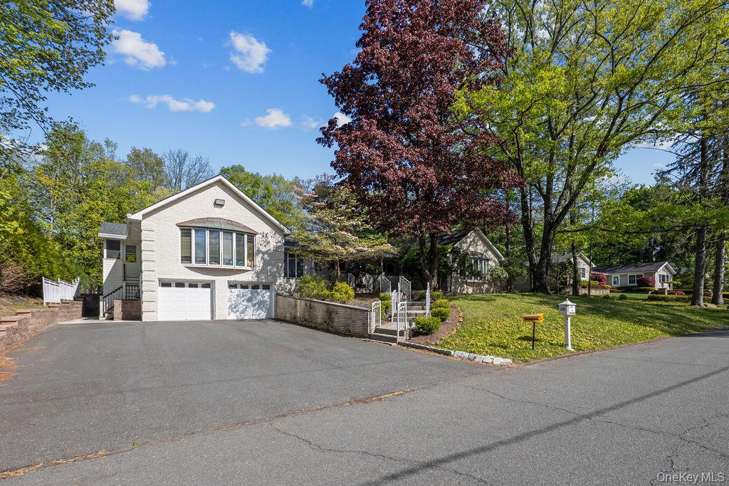 10 Elyise Road Monsey, NY 10952 - Photo 3 of 40 a front view of a house with a yard