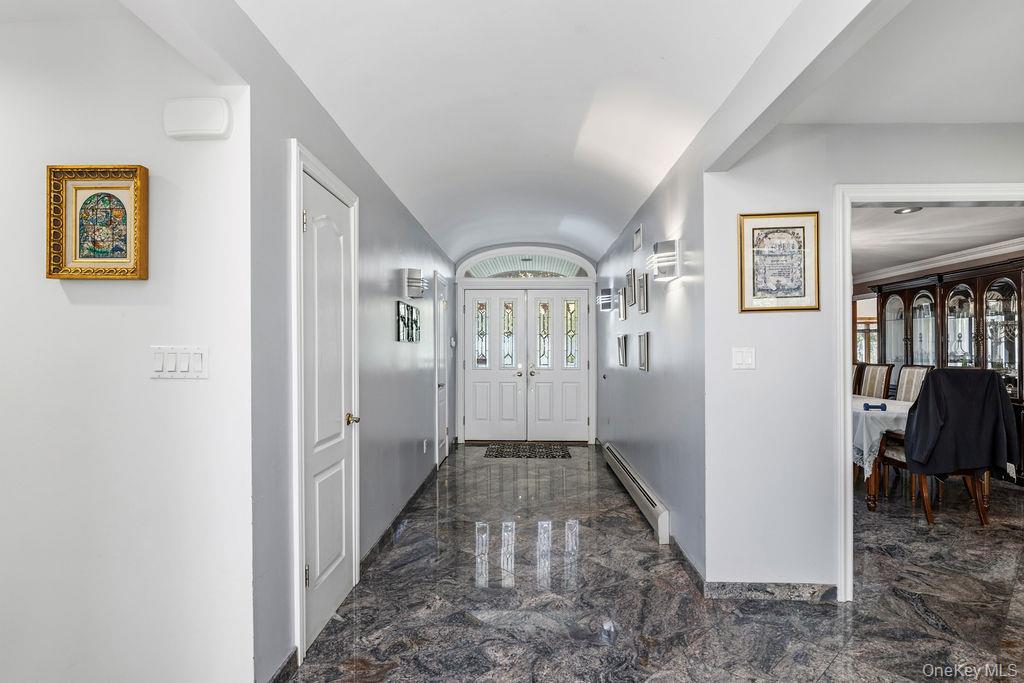 10 Elyise Road Monsey, NY 10952 - Photo 6 of 40 a view of a hallway with windows