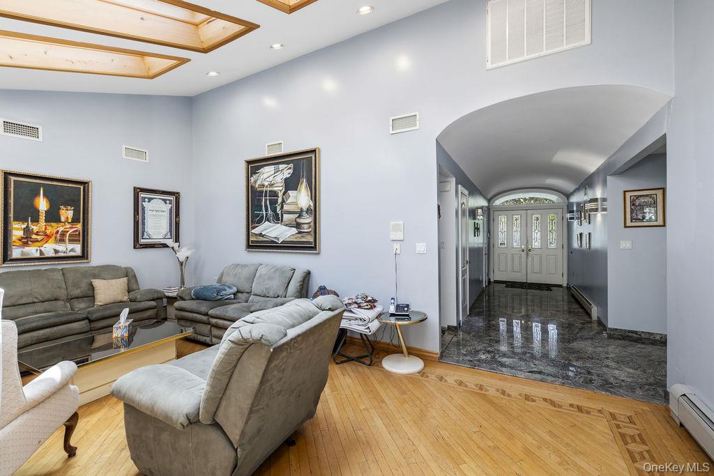 10 Elyise Road Monsey, NY 10952 - Photo 7 of 40 a living room with furniture and a flat screen tv