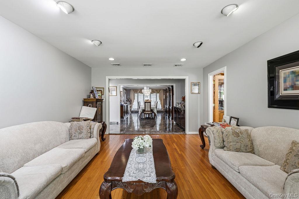 10 Elyise Road Monsey, NY 10952 - Photo 10 of 40 a living room with furniture and wooden floor