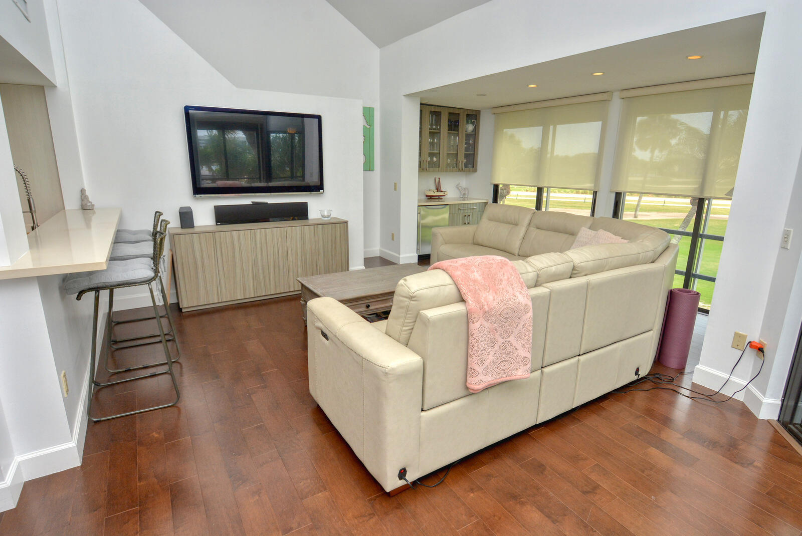 318 Golfview Circle Stuart, FL 34996 - Photo 14 of 39 a living room with furniture and a flat screen tv