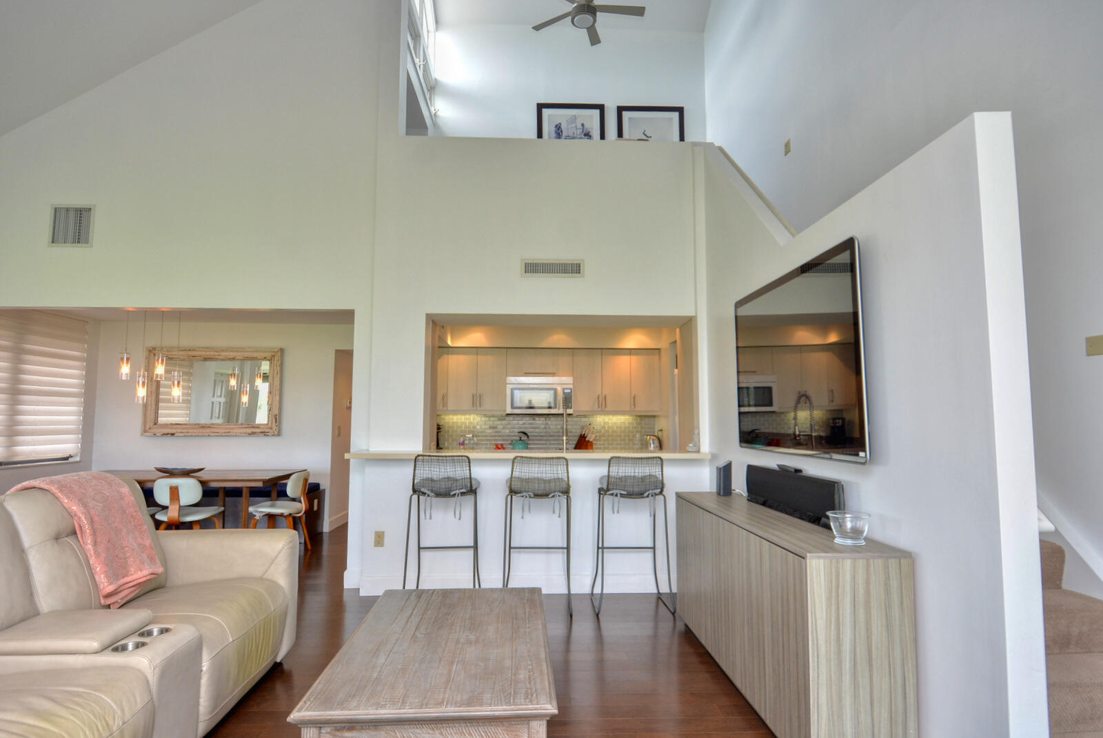 318 Golfview Circle Stuart, FL 34996 - Photo 17 of 39 a living room with furniture and a flat screen tv