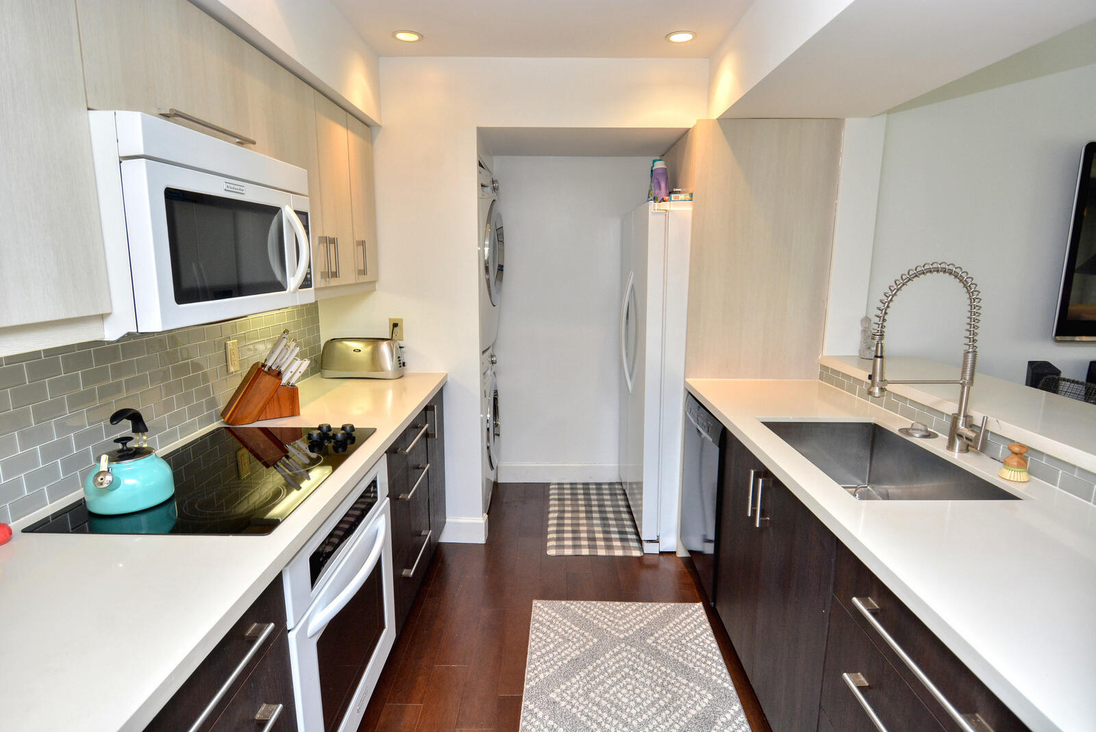 318 Golfview Circle Stuart, FL 34996 - Photo 18 of 39 a kitchen with a sink stove and cabinets