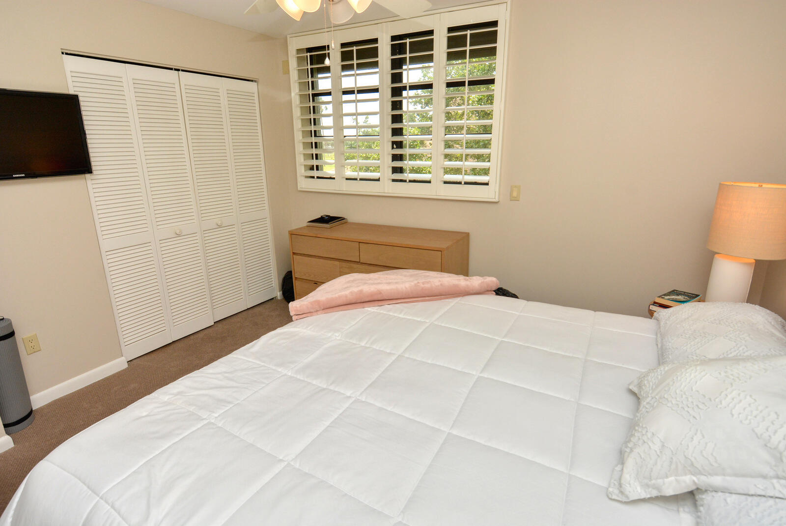 318 Golfview Circle Stuart, FL 34996 - Photo 22 of 39 a bedroom with a bed and a window