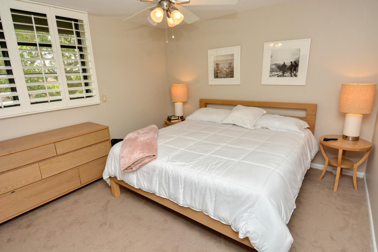 318 Golfview Circle Stuart, FL 34996 - Photo 24 of 39 a large bed sitting in a bedroom next to a window