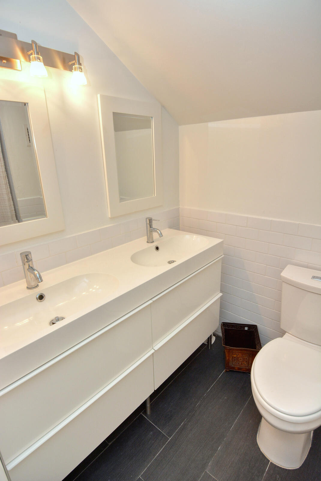 318 Golfview Circle Stuart, FL 34996 - Photo 32 of 39 a bathroom with a sink a toilet and a mirror