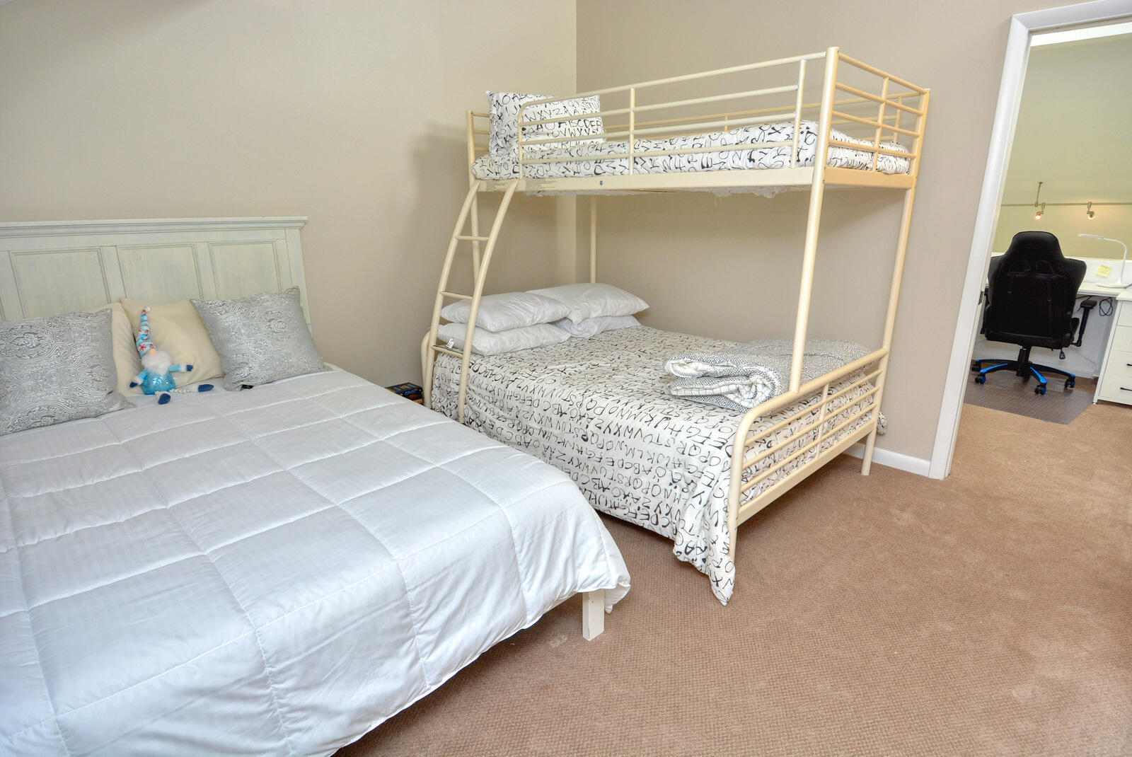 318 Golfview Circle Stuart, FL 34996 - Photo 35 of 39 a bedroom with a bed and a mirror