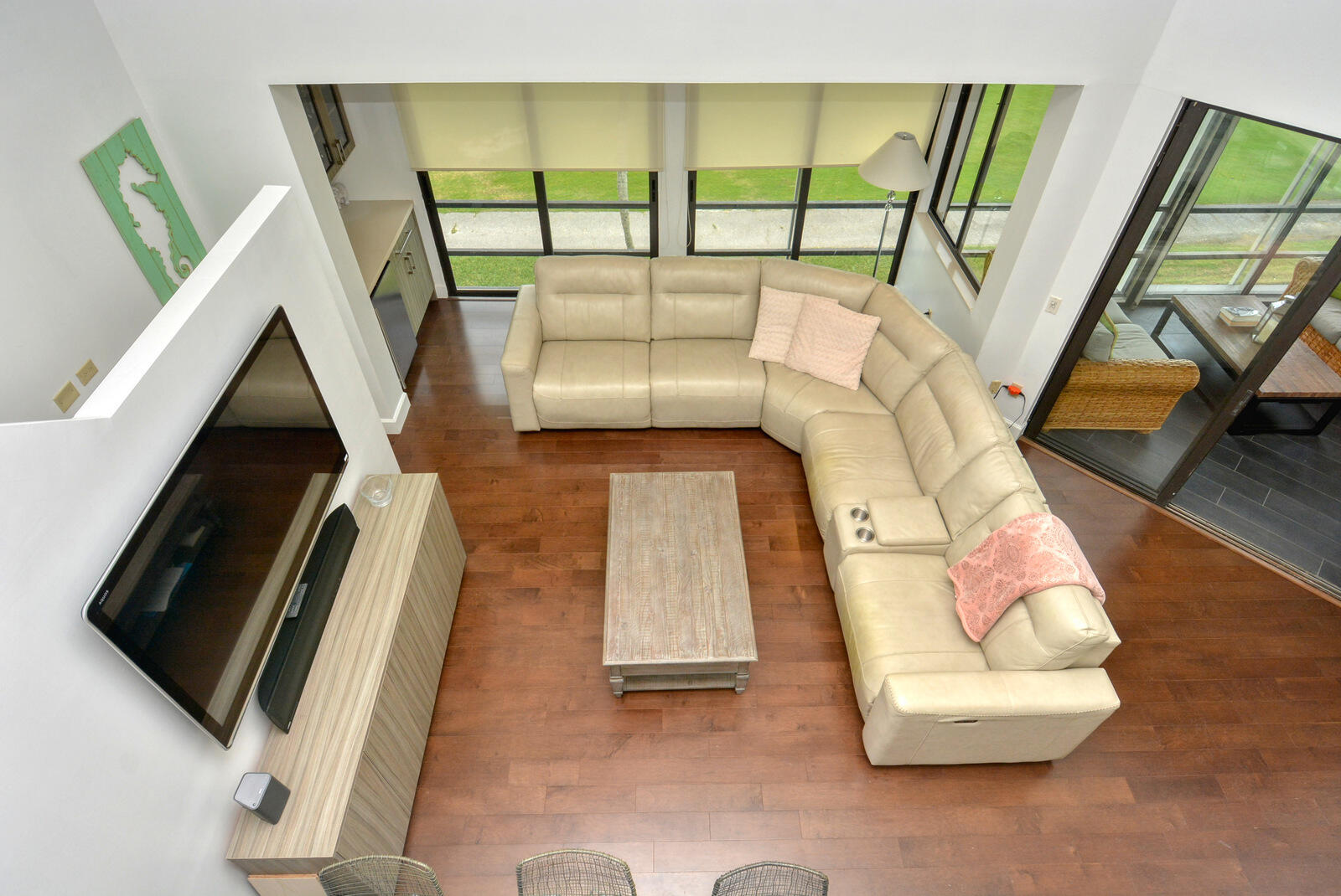 318 Golfview Circle Stuart, FL 34996 - Photo 36 of 39 a living room with furniture and a flat screen tv