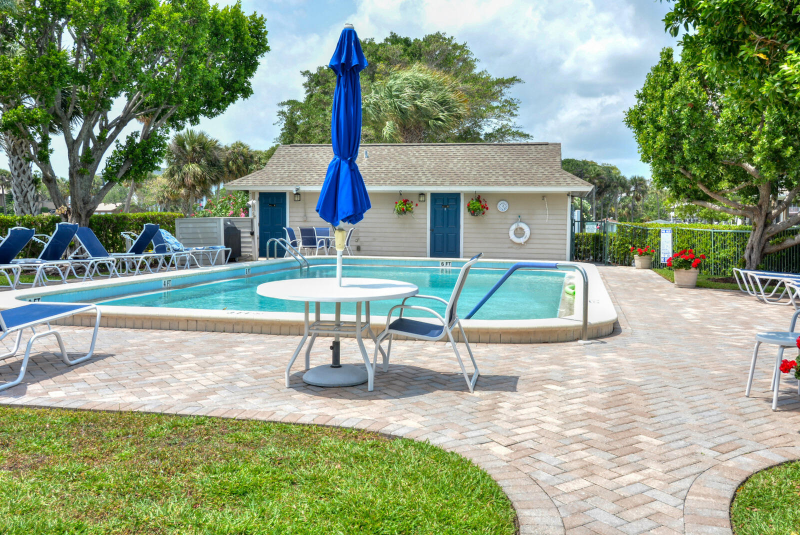 318 Golfview Circle Stuart, FL 34996 - Photo 39 of 39 a view of a house with a yard and sitting area