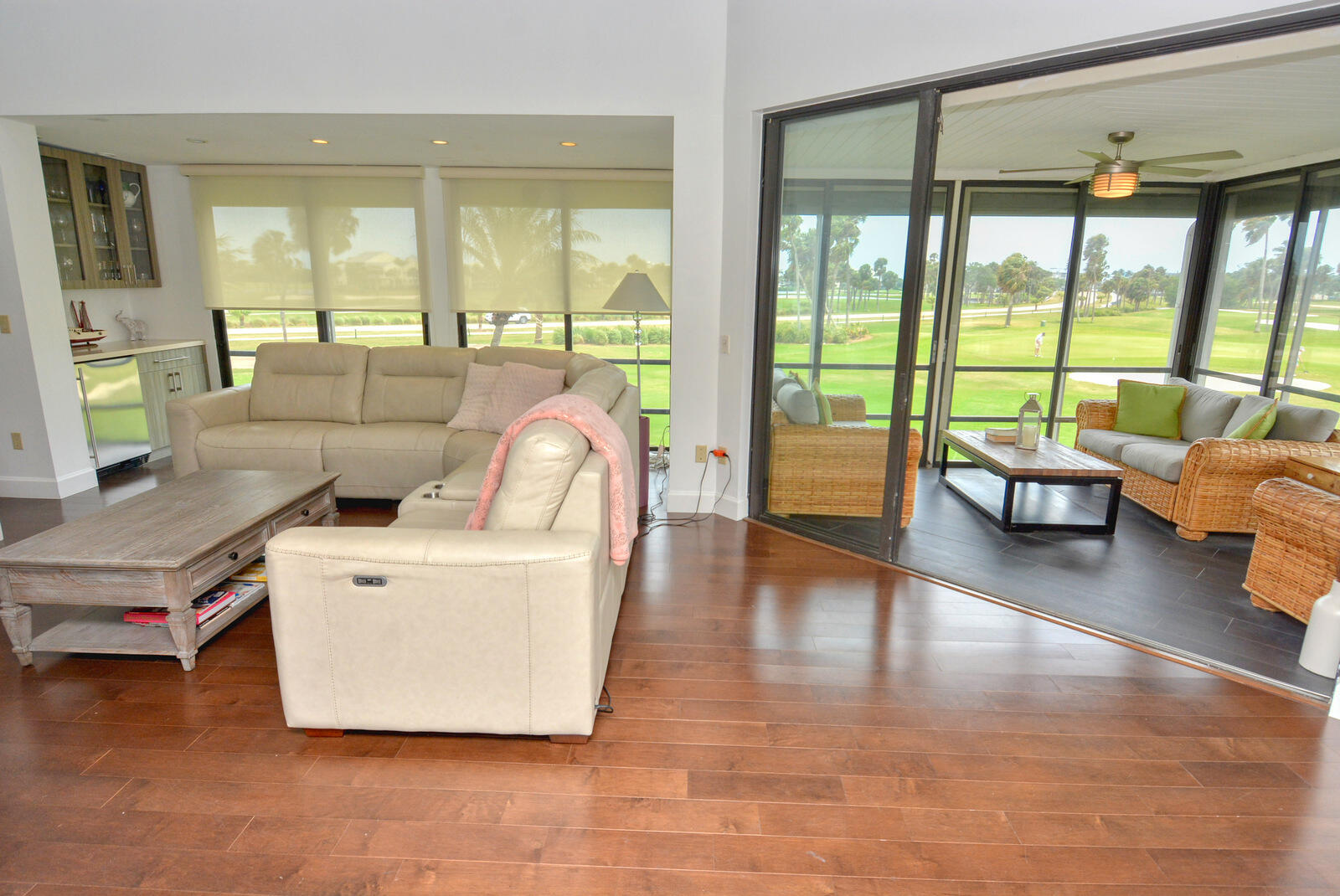 318 Golfview Circle Stuart, FL 34996 - Photo 6 of 39 a living room with furniture and floor to ceiling windows
