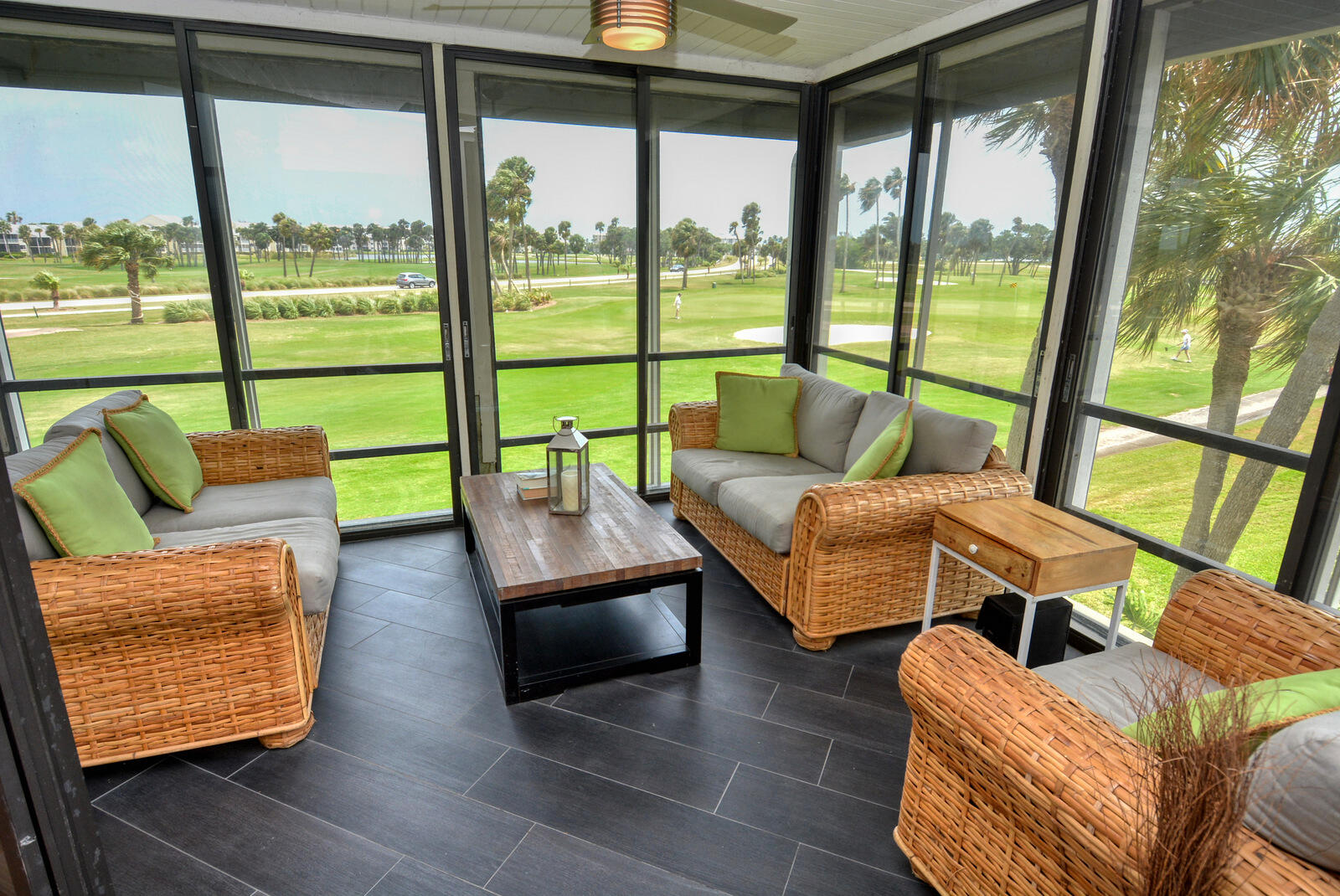 318 Golfview Circle Stuart, FL 34996 - Photo 10 of 39 a living room with furniture and floor to ceiling windows