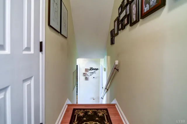 a view of a hallway with windows