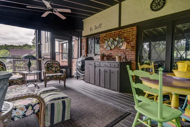 a view of a chairs and table in a patio