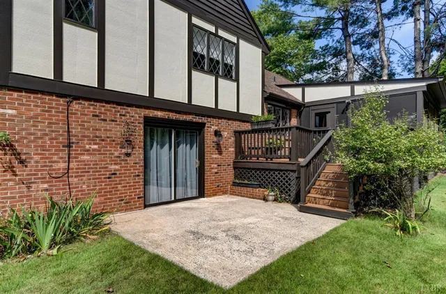 a view of a door and wooden floor