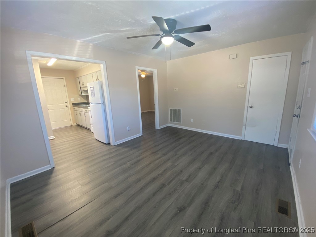 4959 B Fieldcrest Drive Fayetteville, NC 28303 - Photo 2 of 8 a view of a livingroom with wooden floor