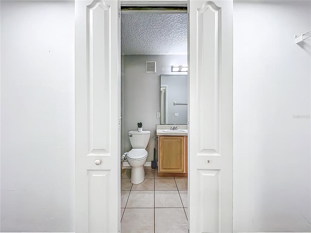 671 Sandy Neck Lane, Unit 102 Altamonte Springs, FL 32714 - Photo 26 of 37 a bathroom with a toilet