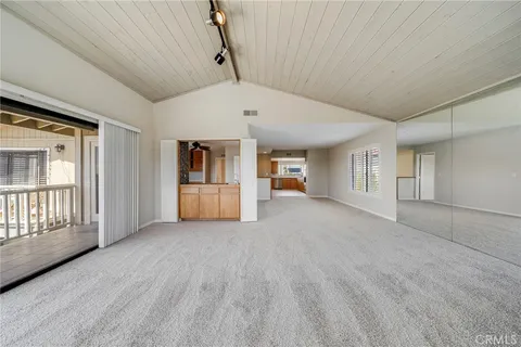 a view of a pathway with a flower pot