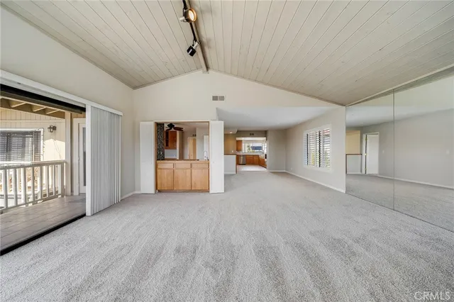 a view of a pathway with a flower pot