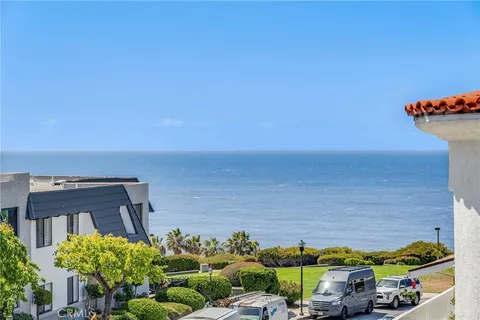 a view of a terrace with chairs