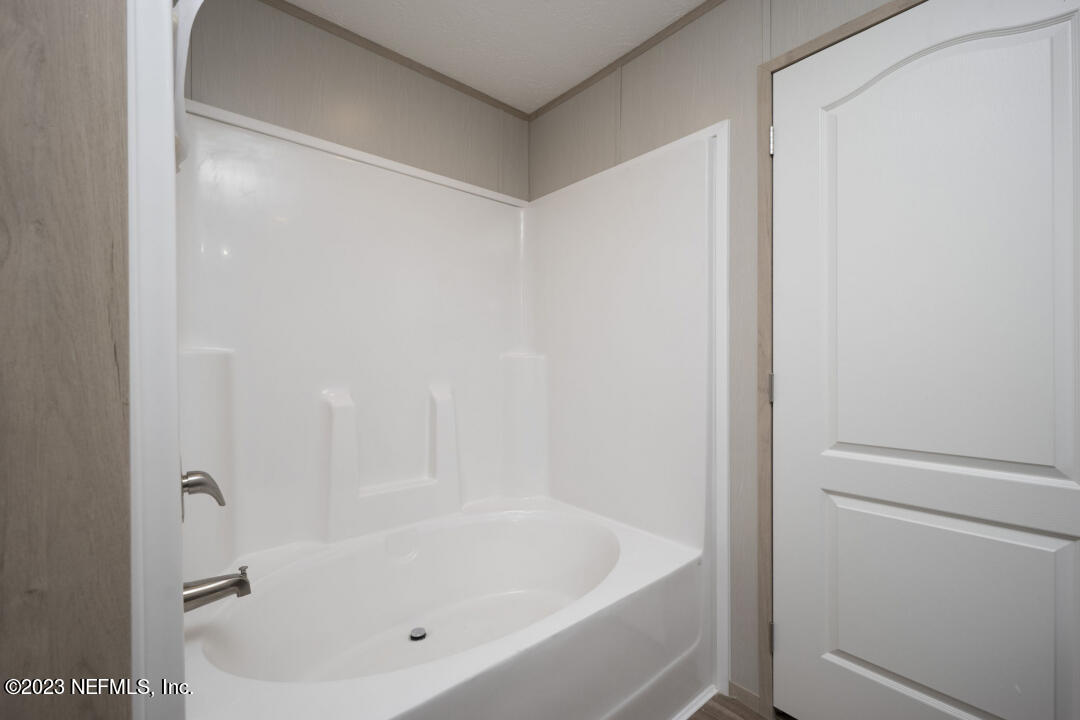 0 Chuck Road Jacksonville, FL 32221 - Photo 16 of 29 a bathroom with a tub
