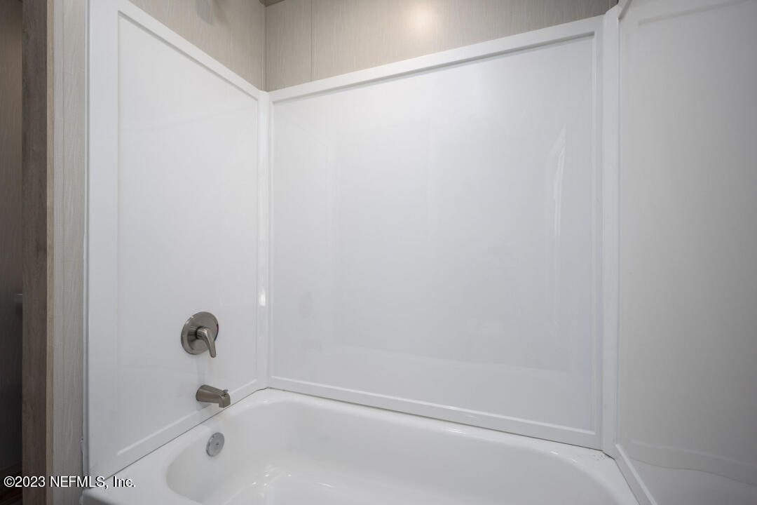 0 Chuck Road Jacksonville, FL 32221 - Photo 20 of 29 a bathroom with a shower and a bath tub
