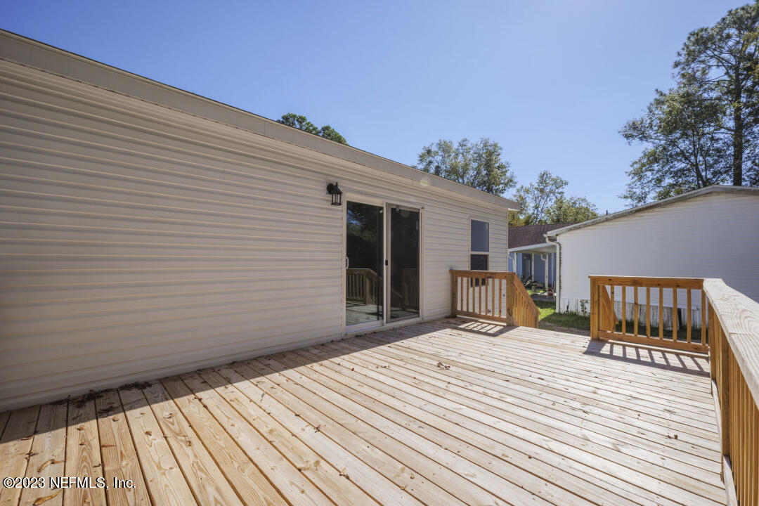 0 Chuck Road Jacksonville, FL 32221 - Photo 26 of 29 a view of backyard with a deck
