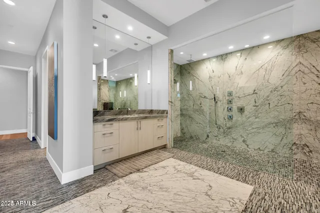 a bathroom with a sink and a mirror