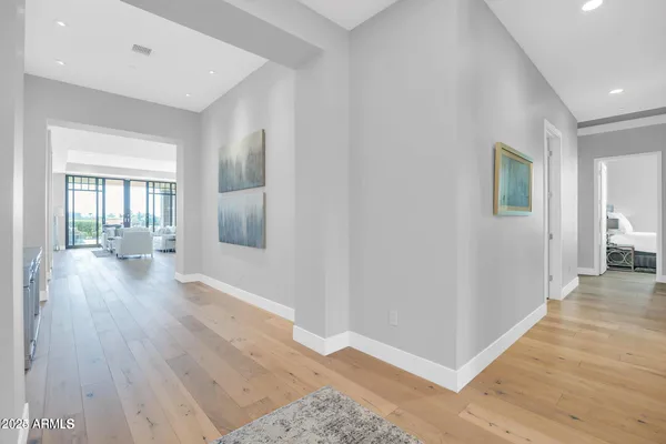 wooden floor in a hall with an entryway