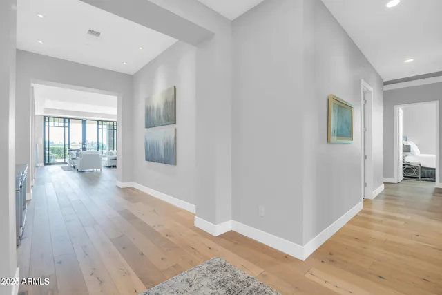wooden floor in a hall with an entryway