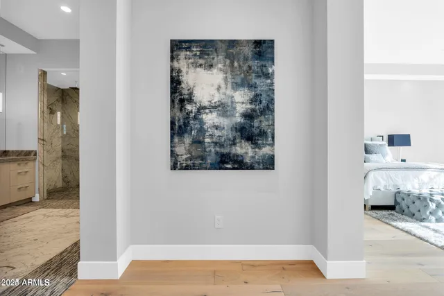 a view of a bedroom from a hallway