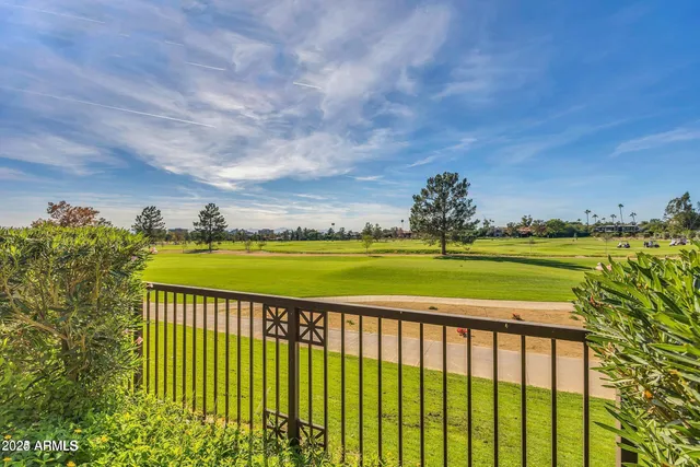 a view of swimming pool with a garden