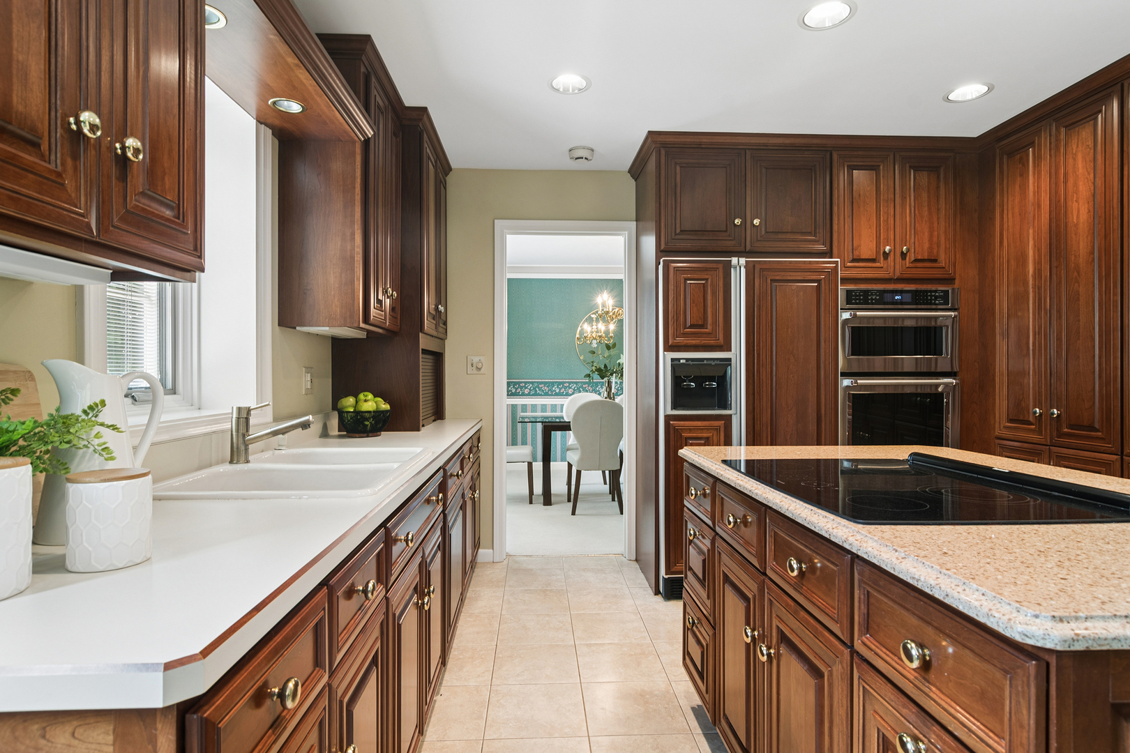 572 East Monterey Road Palatine, IL 60074 - Photo 13 of 27 a kitchen with kitchen island granite countertop a sink and refrigerator