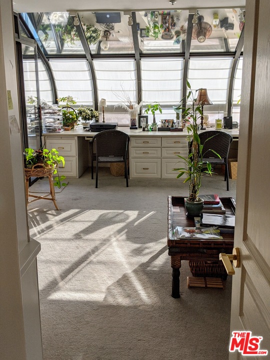 880 West 1st Street, Unit 603 Los Angeles, CA 90012 - Photo 15 of 54 a room with furniture and a window