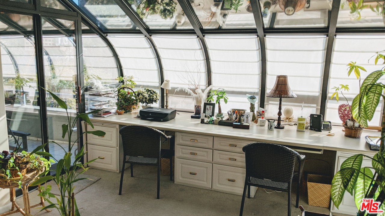 880 West 1st Street, Unit 603 Los Angeles, CA 90012 - Photo 17 of 54 a dining room with furniture and window