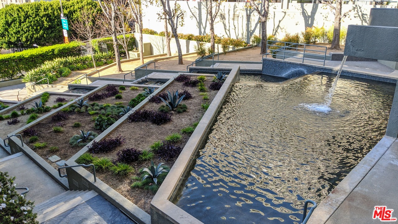 880 West 1st Street, Unit 603 Los Angeles, CA 90012 - Photo 3 of 54 a view of swimming pool with a back yard