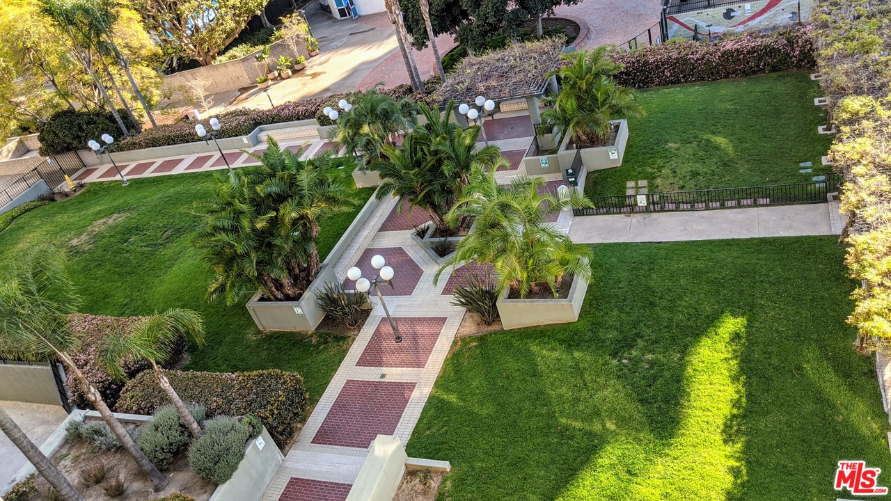 880 West 1st Street, Unit 603 Los Angeles, CA 90012 - Photo 21 of 54 an aerial view of a house with a garden