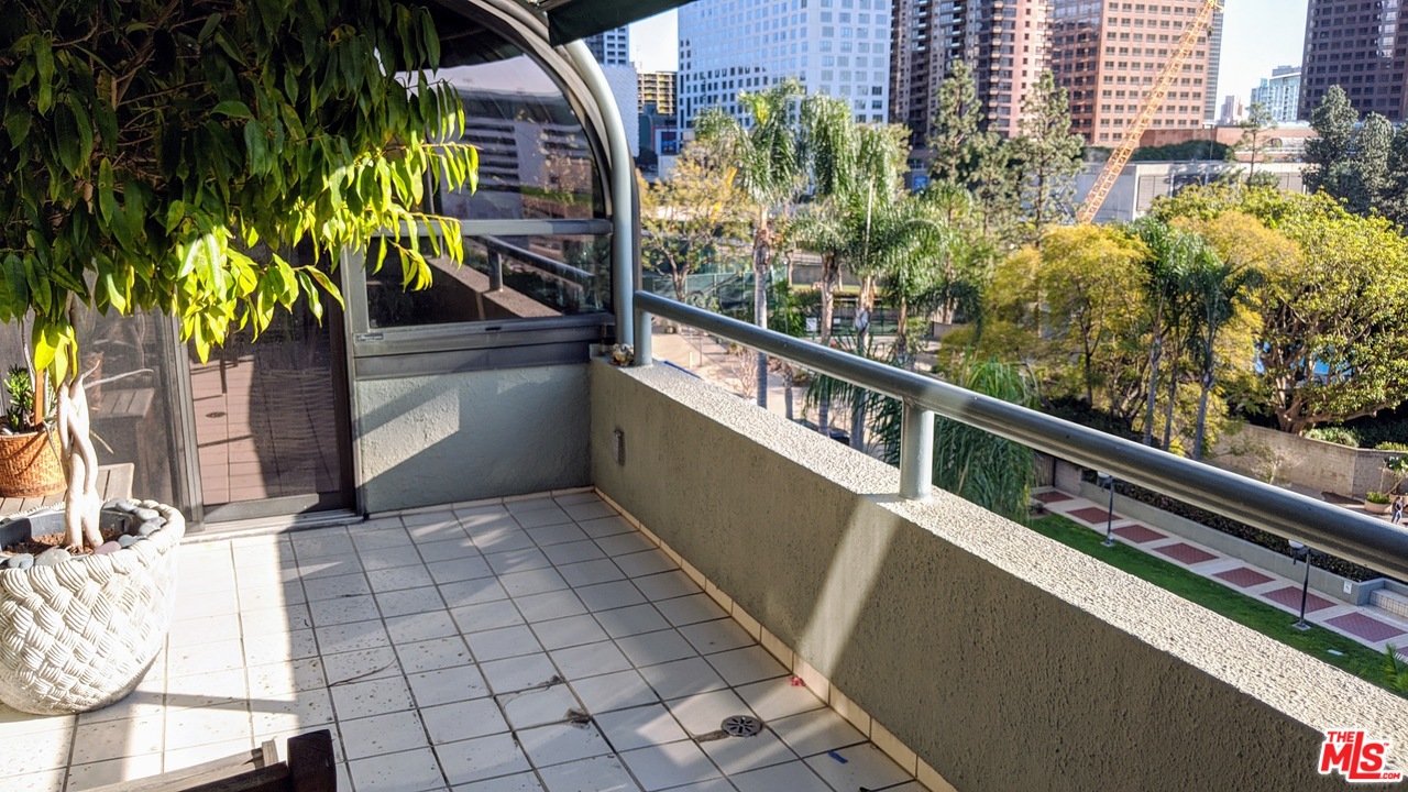 880 West 1st Street, Unit 603 Los Angeles, CA 90012 - Photo 24 of 54 a view of balcony with a potted plant