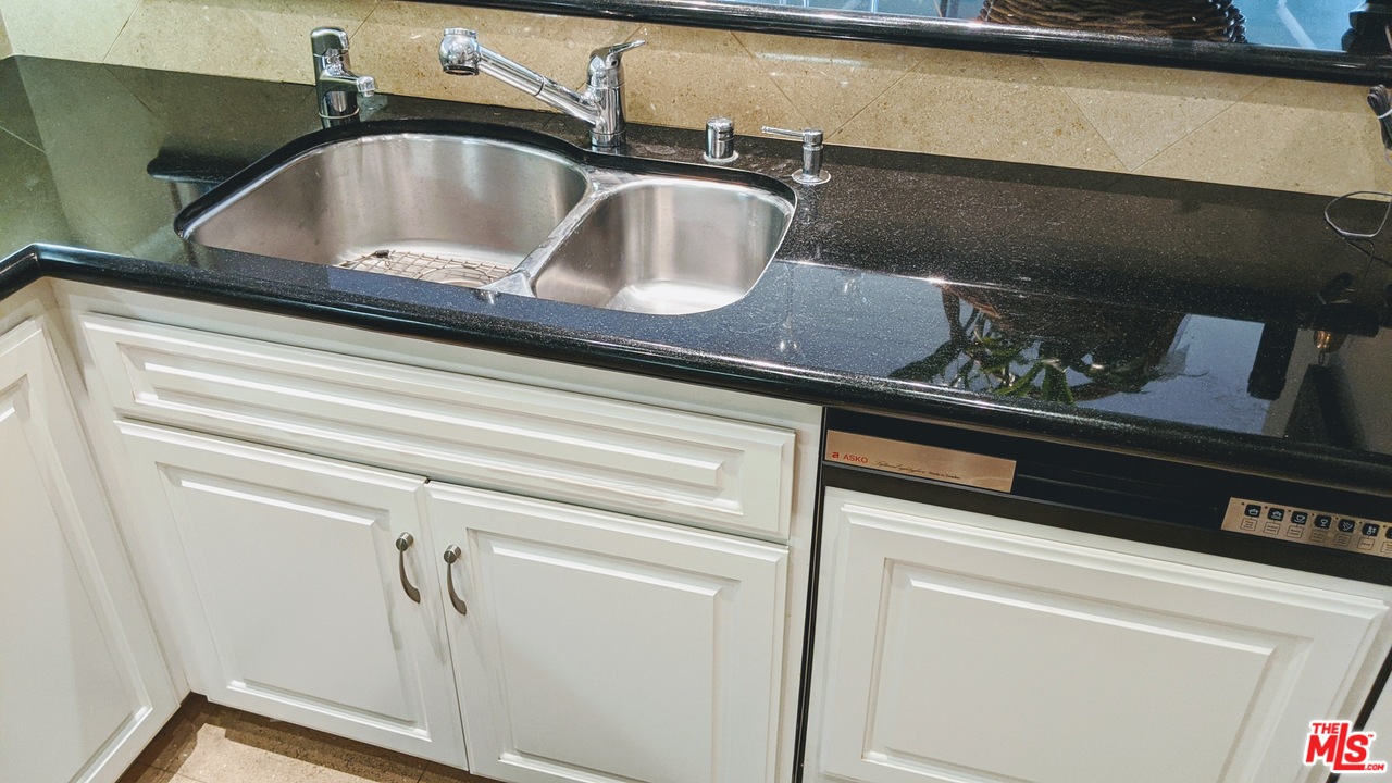 880 West 1st Street, Unit 603 Los Angeles, CA 90012 - Photo 28 of 54 a close view of sink and tap