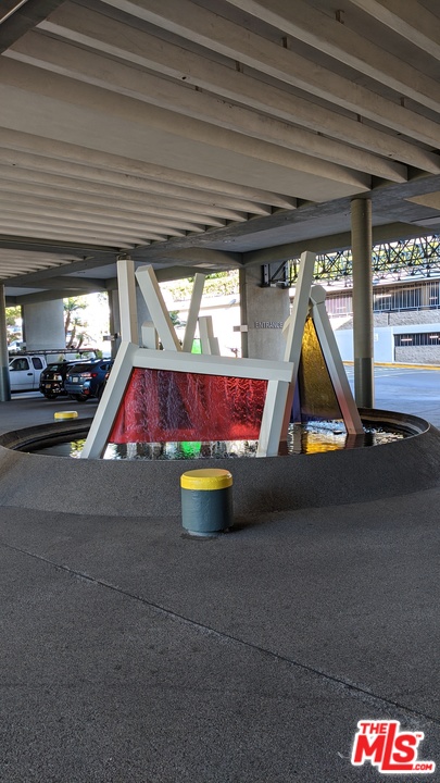 880 West 1st Street, Unit 603 Los Angeles, CA 90012 - Photo 4 of 54 a room with painted walls and stairs