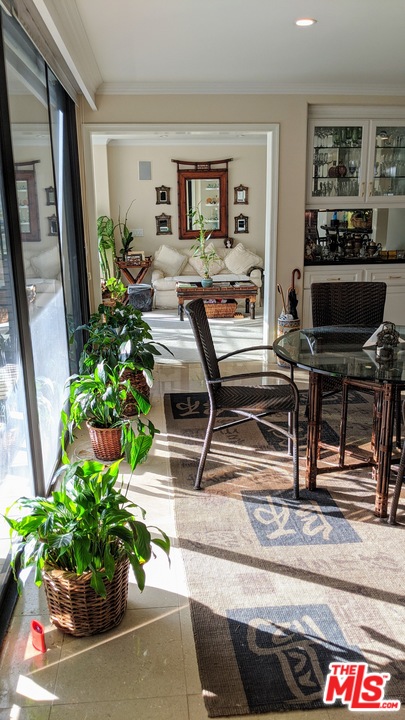 880 West 1st Street, Unit 603 Los Angeles, CA 90012 - Photo 36 of 54 a living room with furniture flowerpot and a potted plant