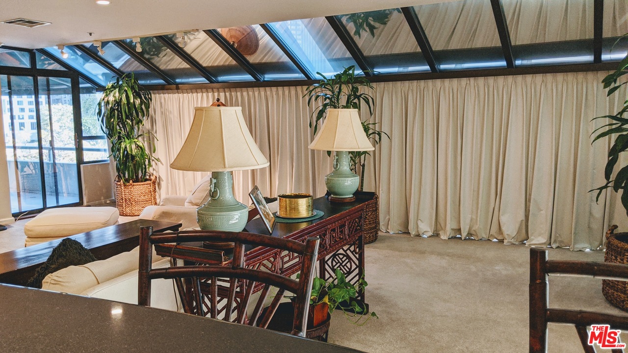 880 West 1st Street, Unit 603 Los Angeles, CA 90012 - Photo 40 of 54 a view of a dining room with furniture window and outside view