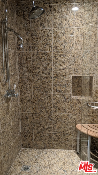 880 West 1st Street, Unit 603 Los Angeles, CA 90012 - Photo 48 of 54 a bathroom with a shower