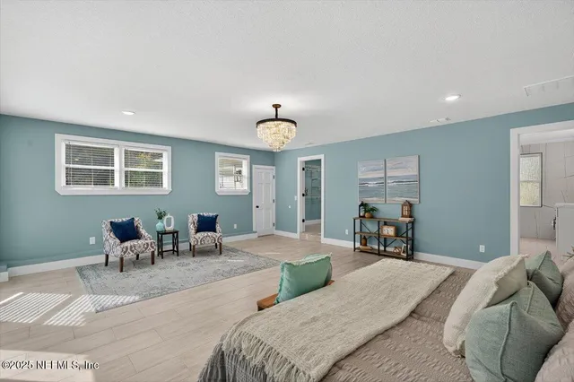 an aerial view of a house with outdoor space