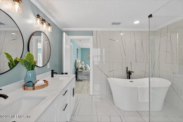 an aerial view of a house with swimming pool and outdoor space