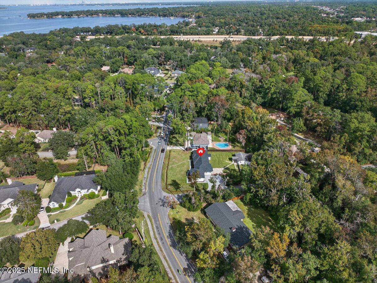 10779 Scott Mill Road Jacksonville, FL 32223 - Photo 75 of 82 an aerial view of residential houses with outdoor space and trees