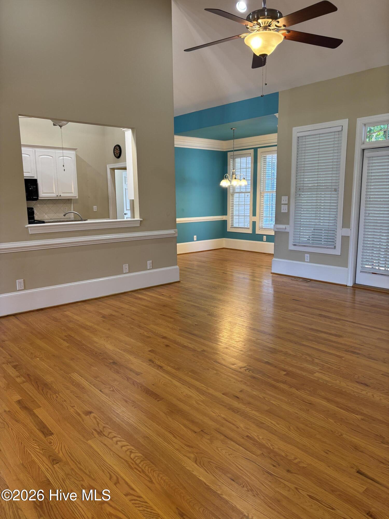 4741 Joyner Road Elm City, NC 27822 - Photo 7 of 37 great room view into kitchen through opening and breakfast area
